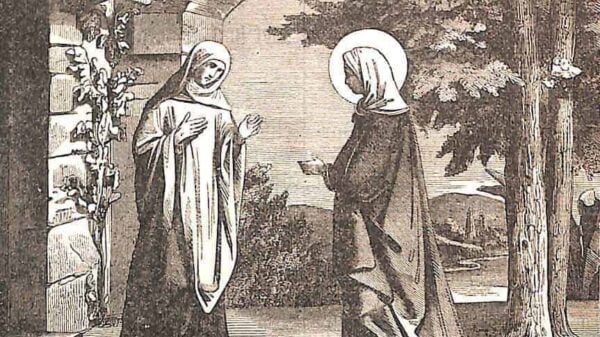 Man sieht die beiden Frauen, Elisabeth und Maria, vor dem Hause Elisabeths; Maria in erhabener, heiliger Haltung, Elisabeth vor dem Eingang des Hauses begrüßt Maria in ehrfürchtiger Haltung
