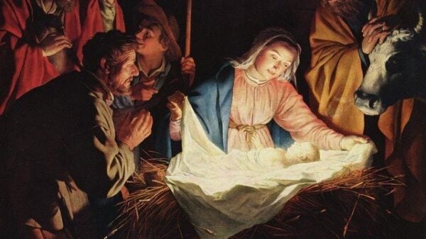 Die Geburt Jesu unseres Heilandes; das Jesuskindlein liegt in der Krippe, von hellem Licht umstrahlt